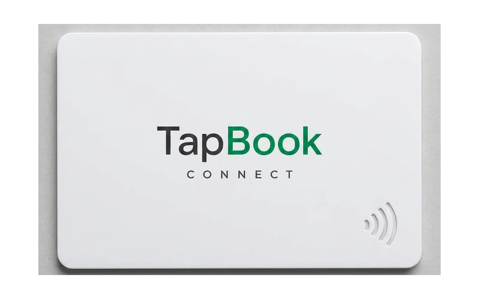 A matte white TapBook Connect NFC card with the wordmark printed on the front